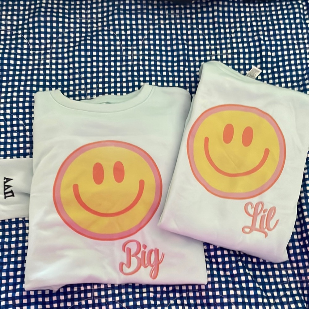 ADPI LIL/BIG matching sweatshirts. Little blue with smiley faces